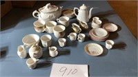 Miniature tea pots, cups, saucers and more,