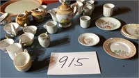 9 piece, miniature cups, saucers, teapot made in