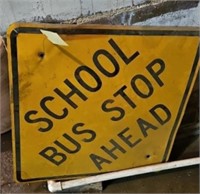 SCHOOL BUS STOP AHEAD ROAD SIGN