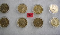 Group of uncirculated Golden Dollar coins