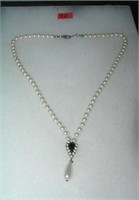 Pearl and simulated stone costume jewelry necklace