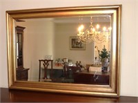 vintage gold framed beveled mirror