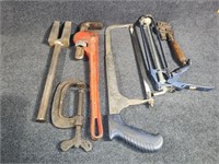 Pipe Wrench, Saw, Caulk Gun, C-Clamp