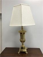 Brass table light with six sided shade.