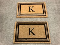 Two outdoor floor mats