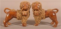 Pair of Italian Porcelain Poodles with Baskets.