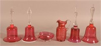 Six Pieces of Blown Cranberry Glass.