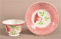 Red Spatter China Thistle Pattern Cup and Saucer.
