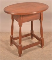 Walnut Period-Style Oval Top Tavern Table.