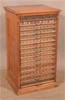 Richardson Silk Co. Oak 14-Drawer Spool Cabinet.