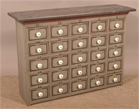 Vintage 25-Drawer Painted Wood Cabinet.
