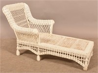 Vintage Child's Size Wicker Chaise Lounge.