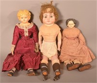 Three Antique Painted Composition Head Dolls.