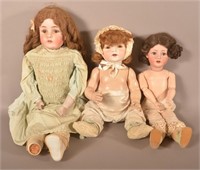 Three Antique German Bisque Head Girl Dolls.