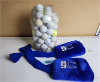 Lg tub of golf balls/items