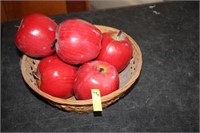 Basket with plastic apples