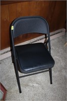 Metal chair with padded seat