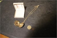 Necklace with holder, two coins