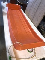 Orange sled, 65 inch long