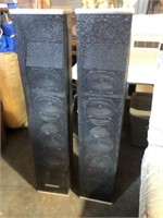 Two speaker towers, made in Michigan