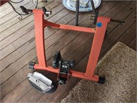 Indoor stationary bike trainer with thru-axle