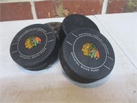 4 Hockey Pucks