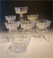 set of 7 - 6 sauce dishes and 1 larger compote