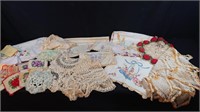 Crochet doilies, pot holders, dresser runners