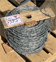 Part Spool of Double Strand Barbed Wire.  #LOC: