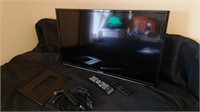 32 Hitachi TV with Fire Stick & Wall Mount