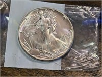 One 1987 -1 Ounce American Silver Eagle
.999
