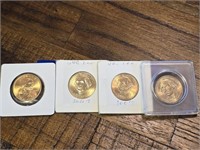 4 $1 US coins, 1 Sacaguea, 4 George Washington