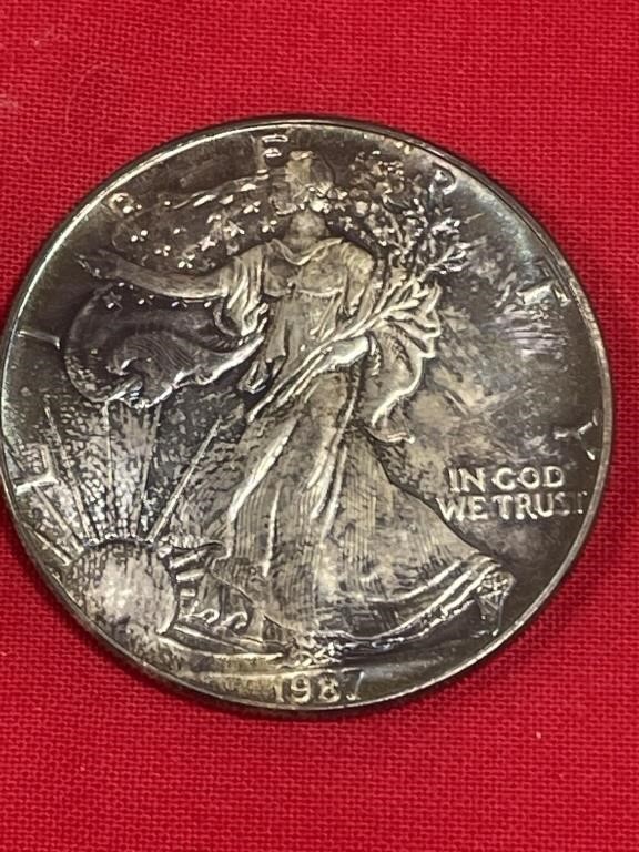 1987 $1 1oz fine Silver
