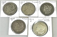 5 Morgan Silver Dollars.