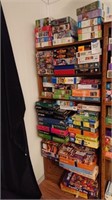 Bookshelf and approx 70 puzzles