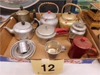 12 child's tin toy kitchen pieces: Tea kettles -