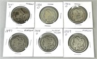 6 Morgan Silver Dollars.