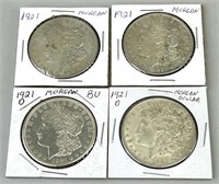 Four 1921 Morgan Silver Dollars.