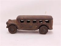 Cast iron toy bus, 3.5" long - 2 cast iron seated