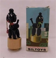 Flat of small vintage toys: Siltoys Italy push