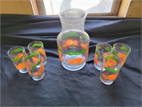 Vintage orange juice glasses and pitcher