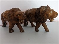 ROARING CARVED LIONS