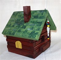 homemade log cabin bird house