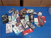 Lot of earbuds and phone accessories