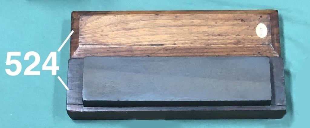 Sharpening stone in a fitted wooden box with lid
