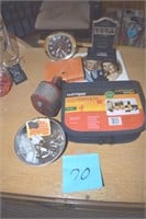 Clock, golf club kit, pencil sharpener, etc