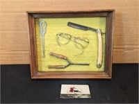 Framed display of antiques