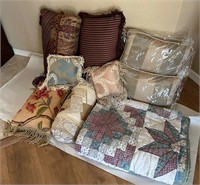 Various Throw Pillows + Floral Quilt