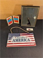 Frames, God Bless America sign