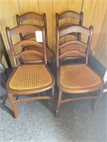 4 matching hardwood chairs with caned seats